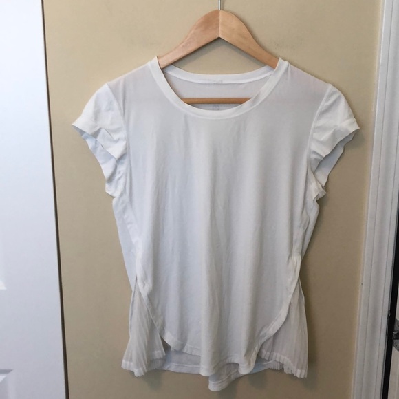 lululemon athletica Tops - Lululemon white ruffled t-shirt sz 6 87503